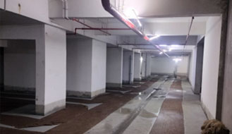 Brigade Nanda Heights : Common Area Finishing Works. Entry portal & Basement VDF flooring as on October '24